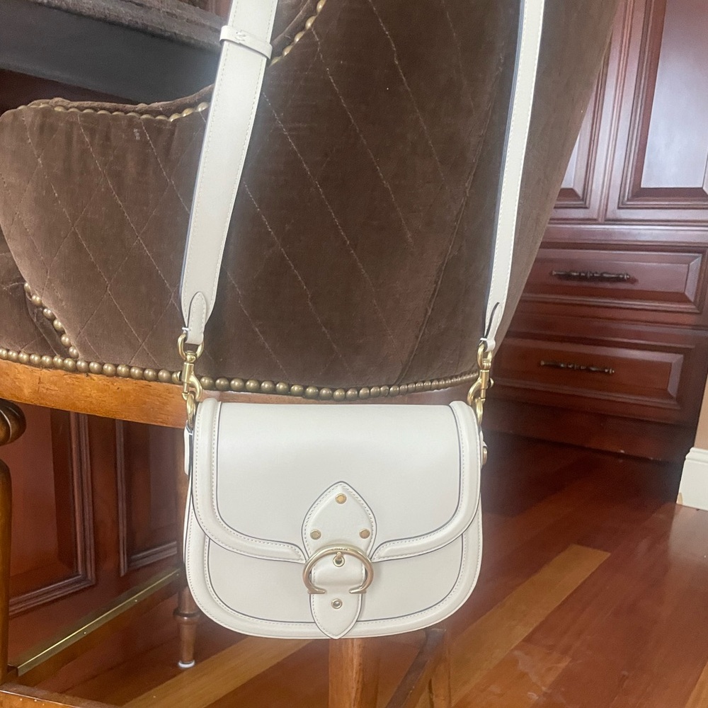 Coach Cream Crossbody Beat Bag with Gold Accents like new.